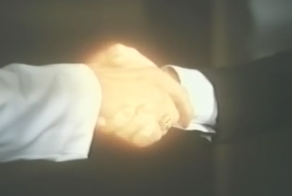 glowing handshake